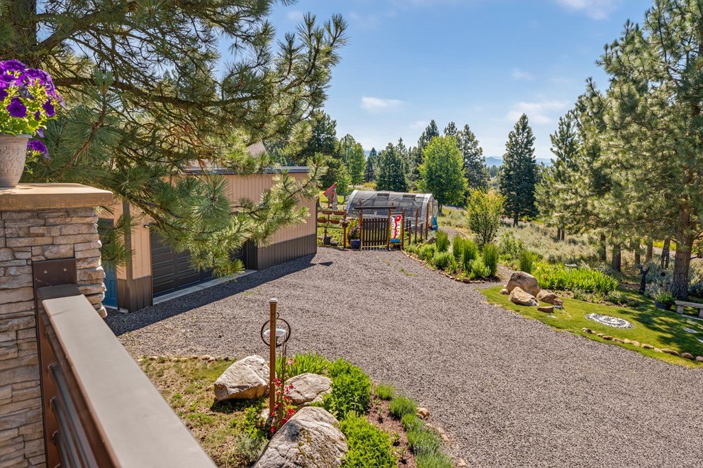 Overlook the 2 car garage/studio, greenhouse