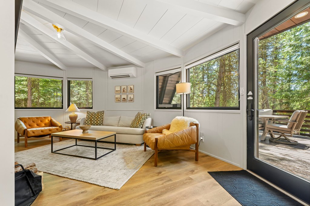 Living Room, The living room opens to a spacious deck that has views of the Payette River and the sounds of the running river.