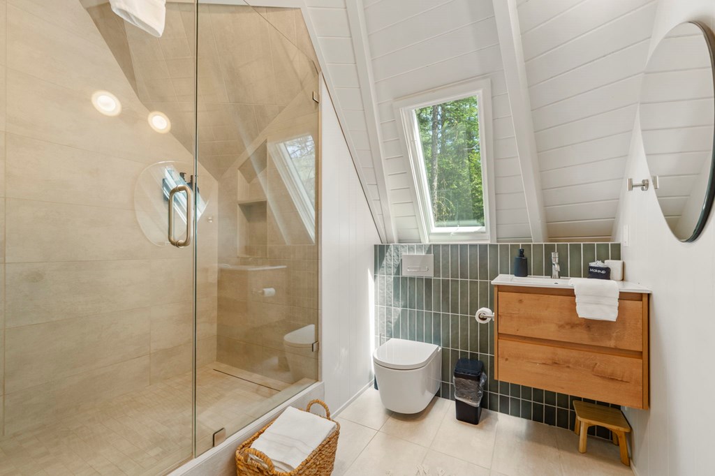 Primary Bath, Glass and tile shower highlight this new bathroom.