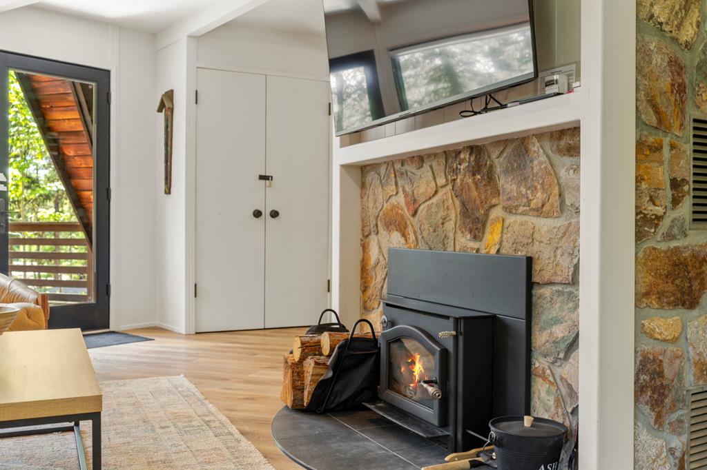 Wood-burning fireplace, Adding atmosphere to the living area and keeping the chill away on a cool morning.