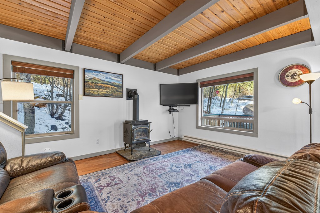 Windows bring in wooded views.