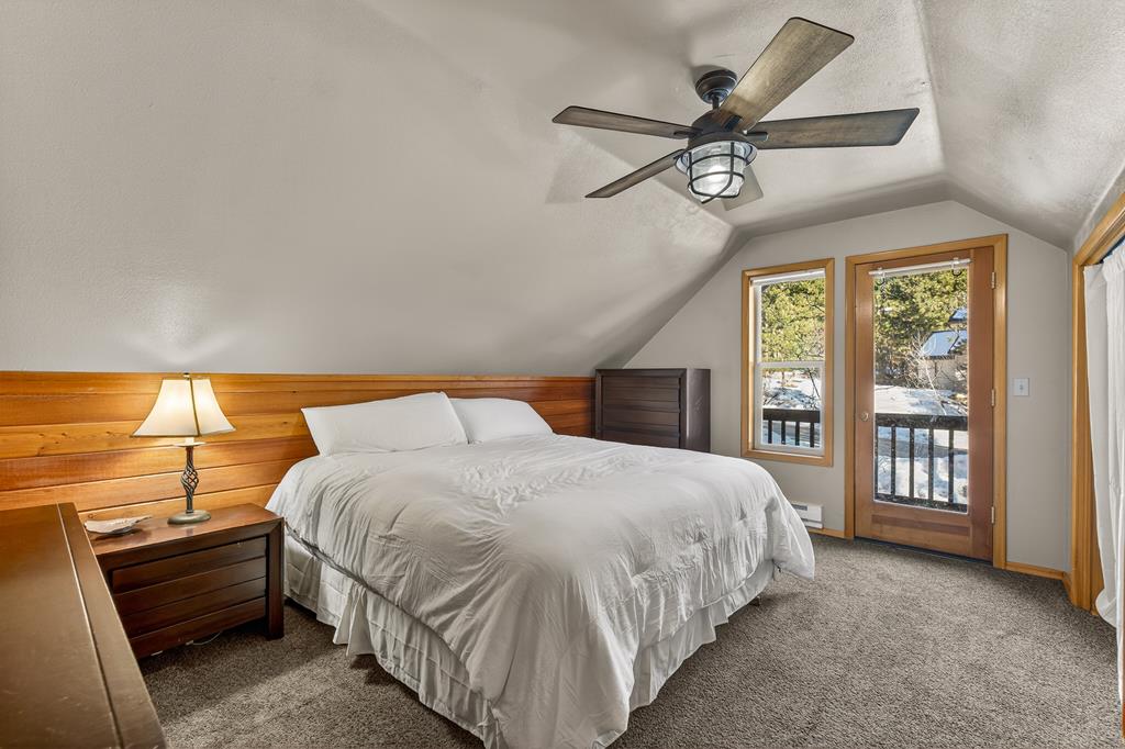 Primary bedroom with balcony