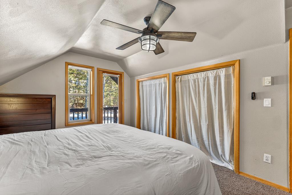 Double closet, vaulted ceilings
