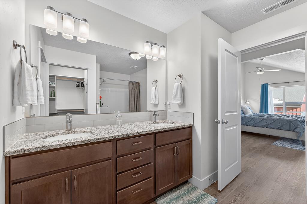 Granite counters, wood cabinets.