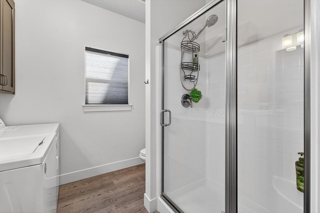 Walk in shower in bathroom.