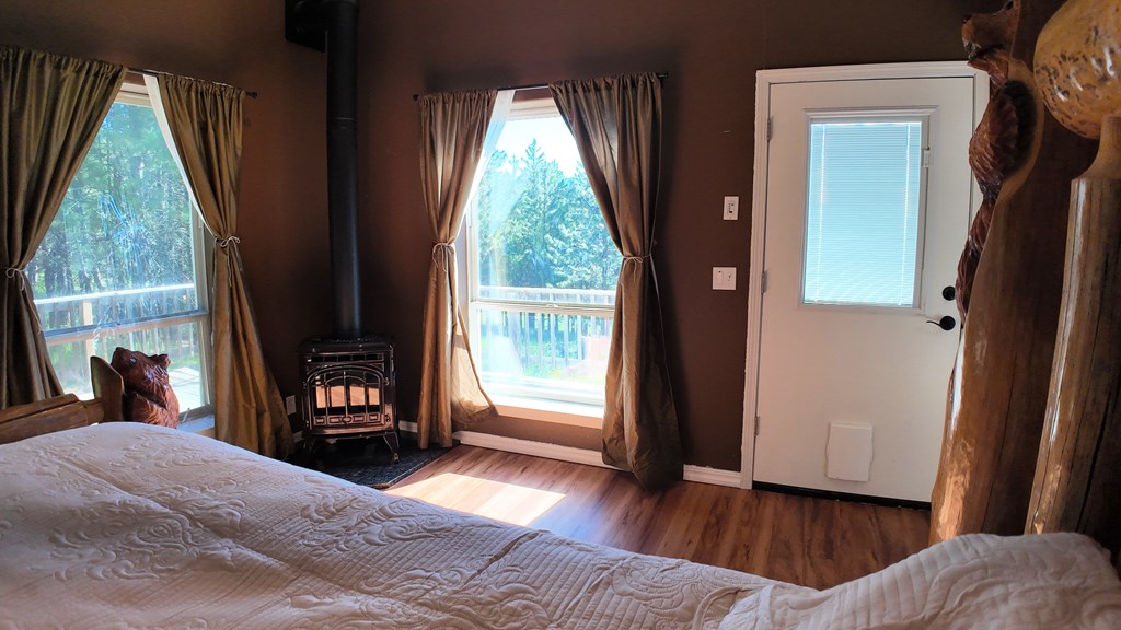 master bedroom with  propane fireplace
