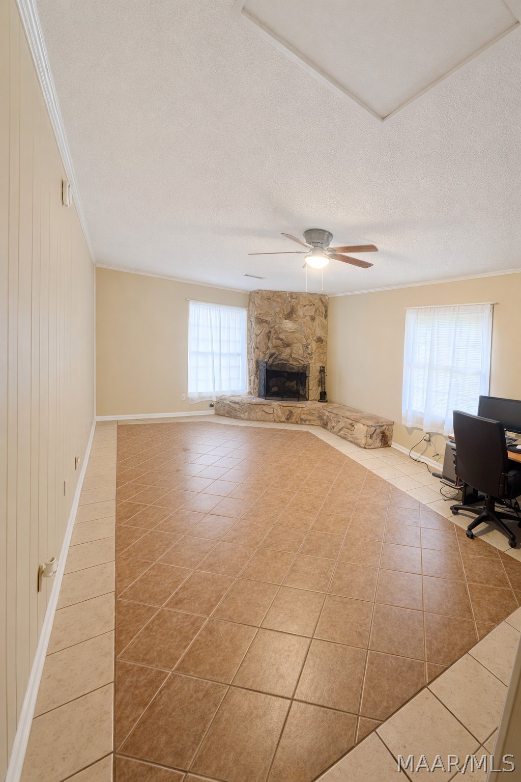 Den area with fireplace