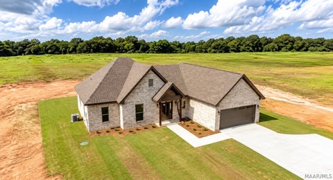 Photo of 718 Riverknolle Road, Tallassee, AL 36078 (MLS # 591254)