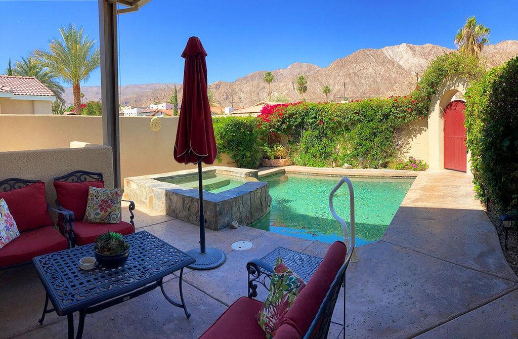 Photo of 52550 Avenida Obregon, La Quinta, CA 92253 (MLS # 219147191)