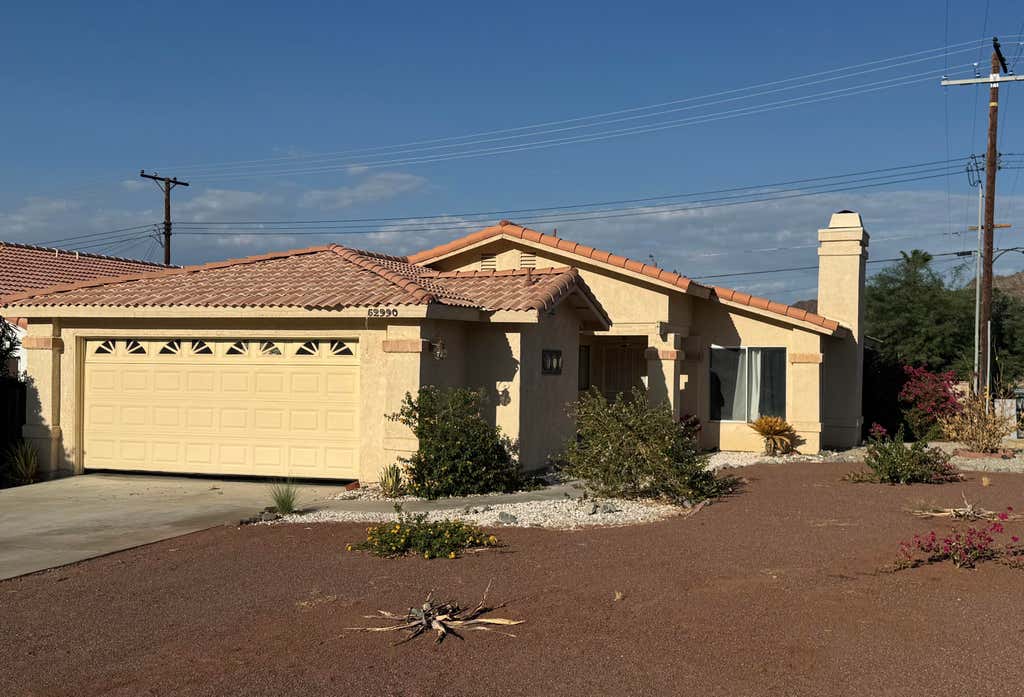 Photo of 52990 Avenida Obregon, La Quinta, CA 92253 (MLS # 219150695)