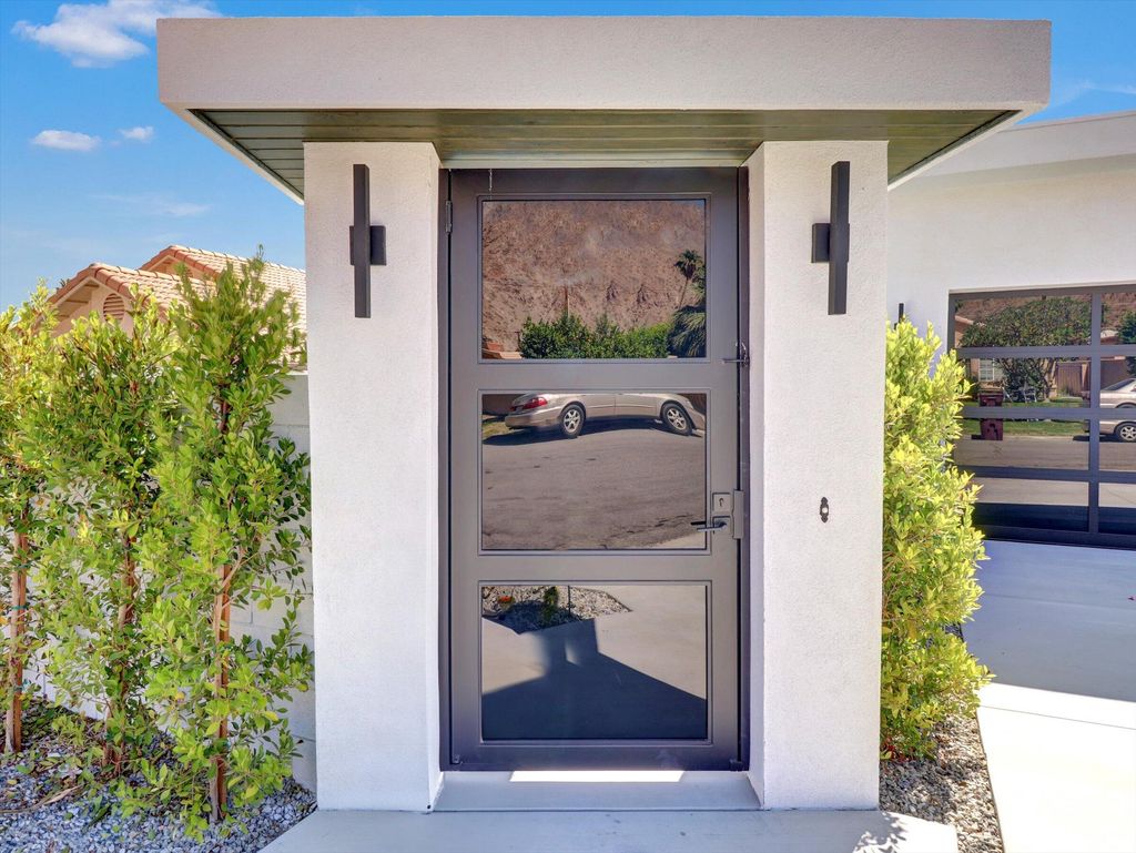 Photo of 52120 Avenida Alvarado, La Quinta, CA 92253 (MLS # 219130090)