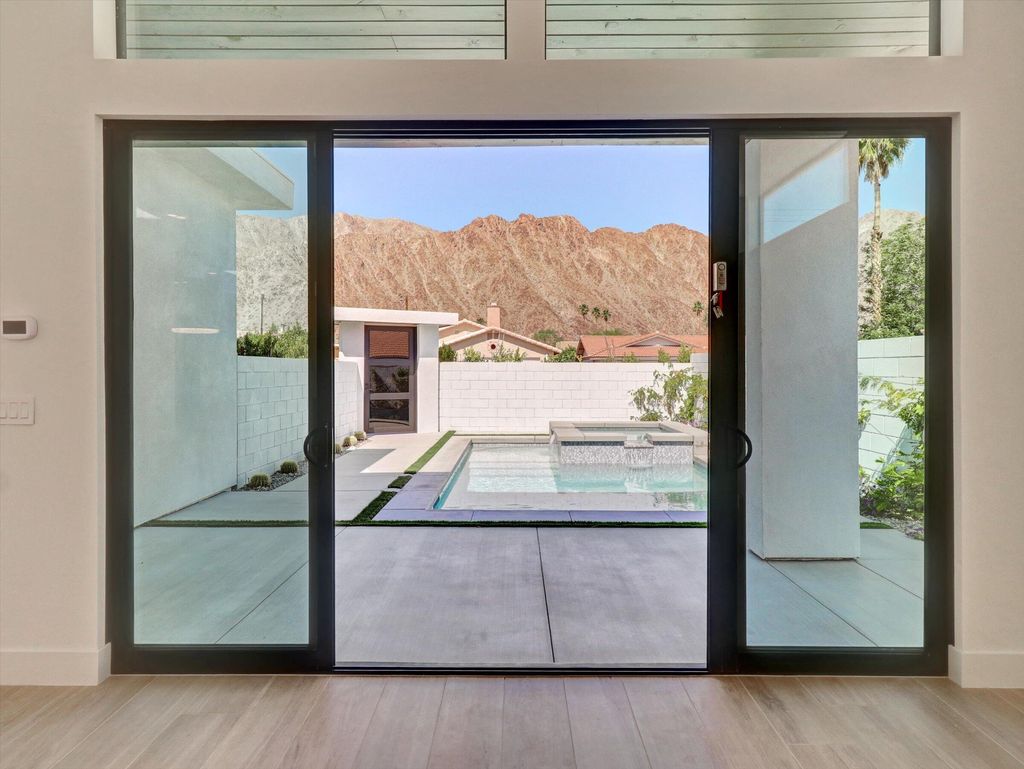 Photo of 52120 Avenida Alvarado, La Quinta, CA 92253 (MLS # 219130090)