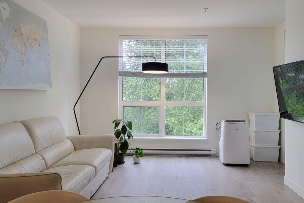 Photo of 8379 201 Street #403, Langley, BC V2Y 3S6 (MLS # R3144886)