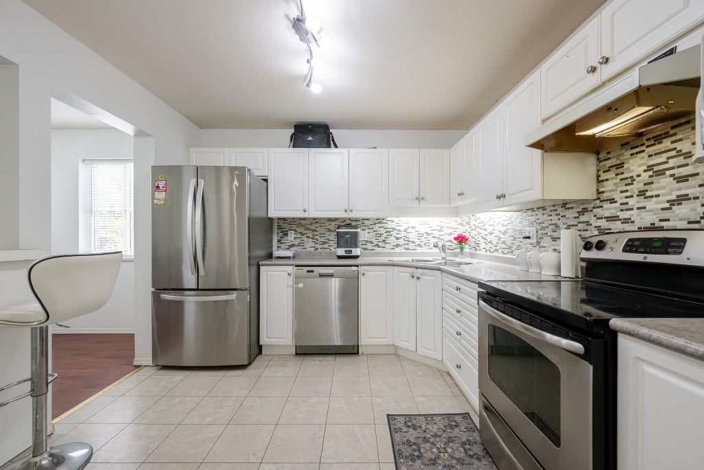 Photo of 2435 Center Street #302, Abbotsford, BC V2T 2N4 (MLS # R3177476)