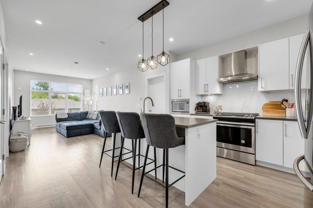 Photo of 15436 31 Avenue #411, Surrey, BC V3Z 1H3 (MLS # R3149884)
