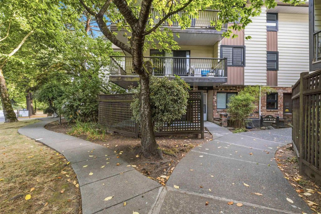 Photo of 7426 138 Street #211, Surrey, BC V3W 8G4 (MLS # R3149597)