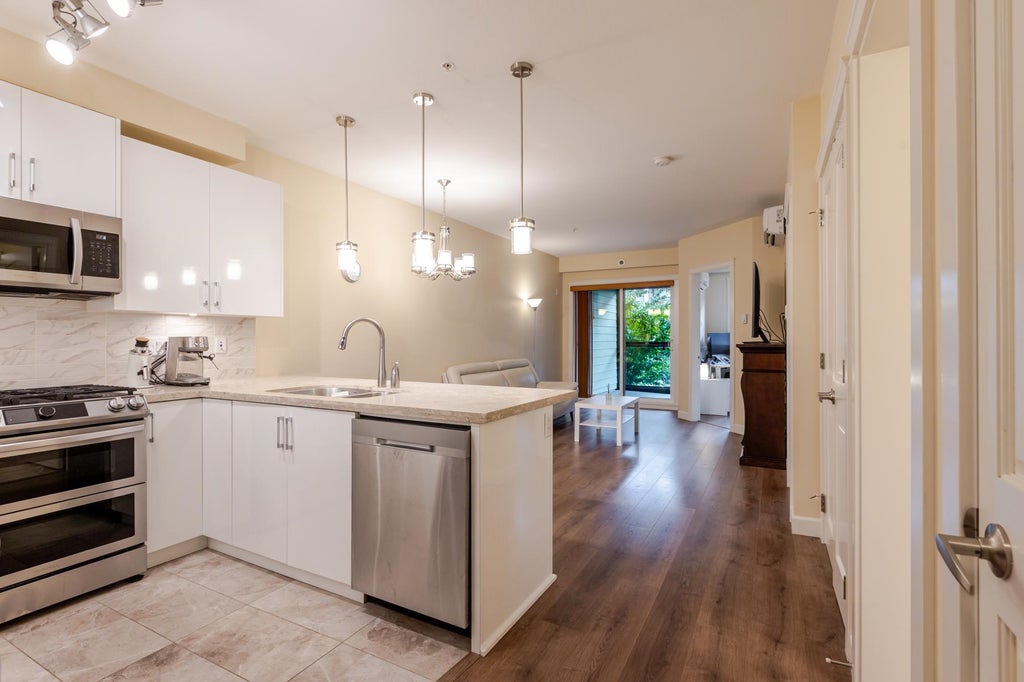 Photo of 8538 203a Street #201, Langley, BC V2Y 3P9 (MLS # R3160220)