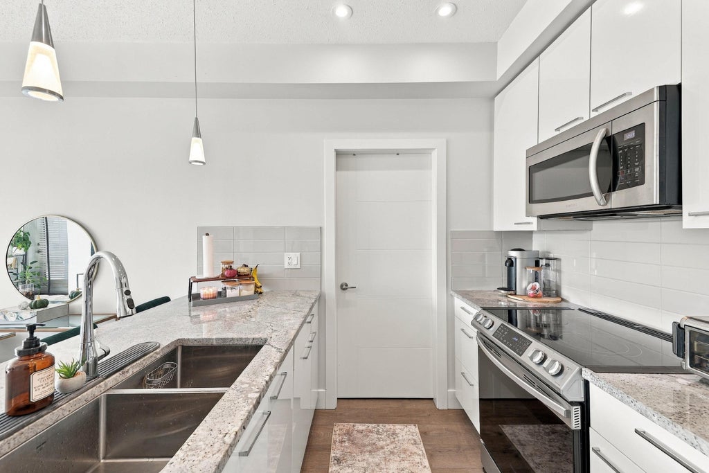 Photo of 5485 Brydon Crescent #210, Langley, BC V3A 0N5 (MLS # R3175374)