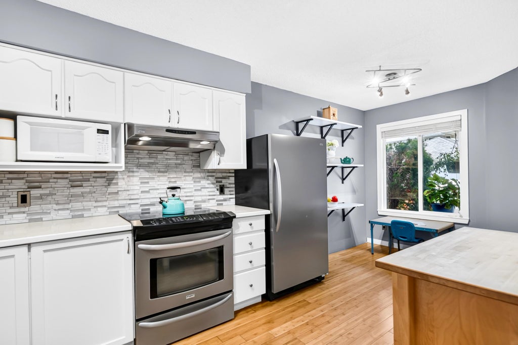 Photo of 9045 Walnut Grove Drive #11, Langley, BC V1M 2E1 (MLS # R3160139)