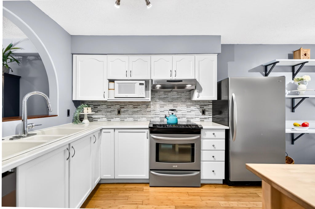 Photo of 9045 Walnut Grove Drive #11, Langley, BC V1M 2E1 (MLS # R3160139)