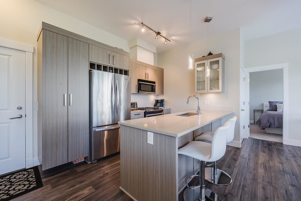 Photo of 22327 River Road #409, Maple Ridge, BC V2X 2C7 (MLS # R3147412)
