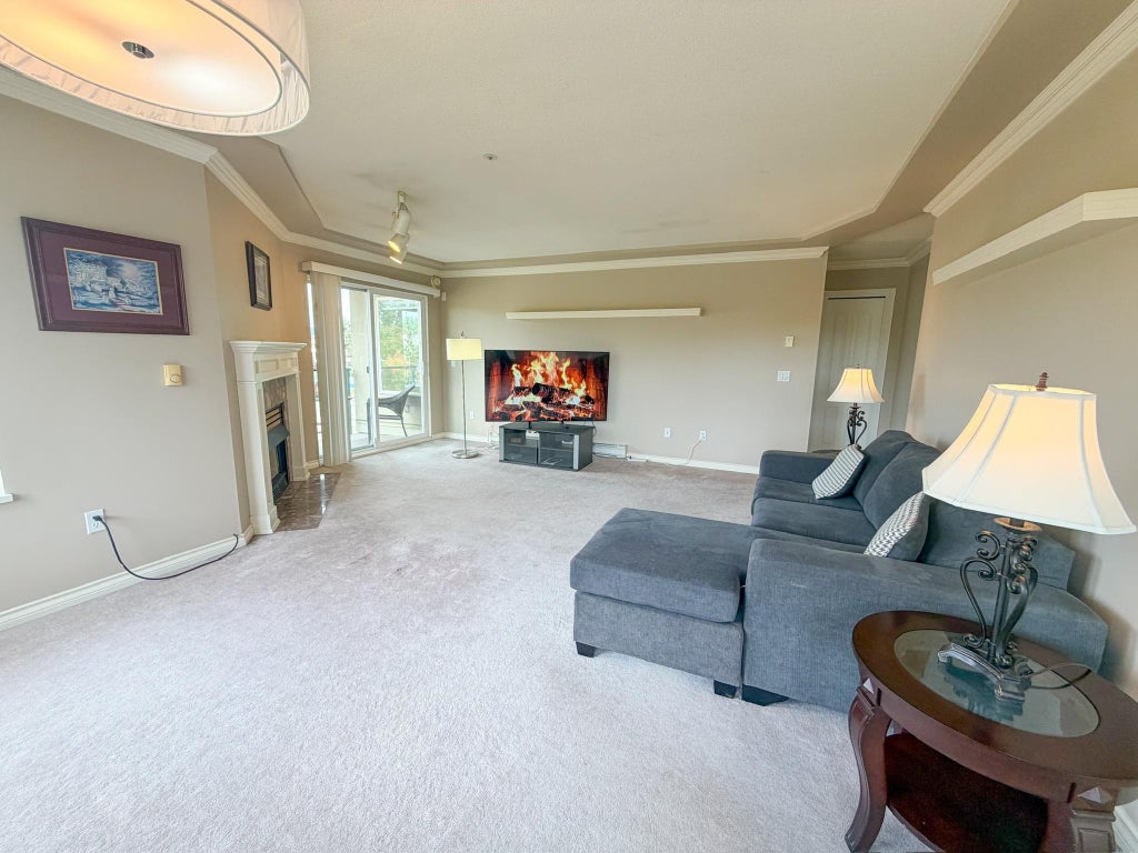 Photo of 20433 53 Avenue #404, Langley, BC V3A 7A6 (MLS # R3146737)