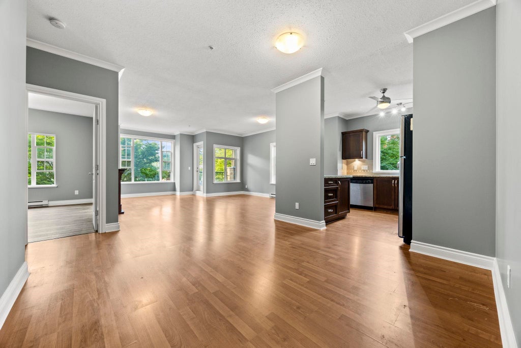 Photo of 20286 53a Avenue #201, Langley, BC V3A 0A8 (MLS # R3147276)
