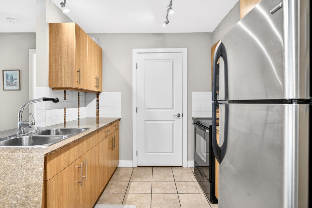 Photo of 12020 207a Street #301, Maple Ridge, BC V2X 8V2 (MLS # R3157386)