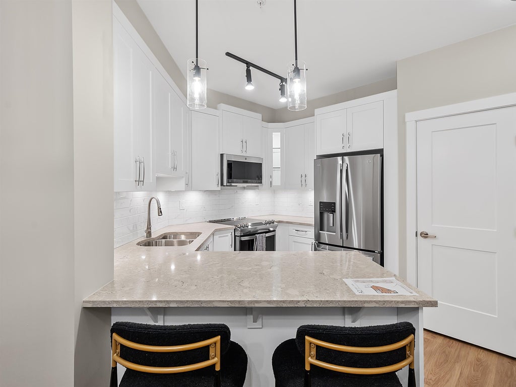 Photo of 8233 208b Street Street #A511, Langley, BC V2Y 4M7 (MLS # R3177124)