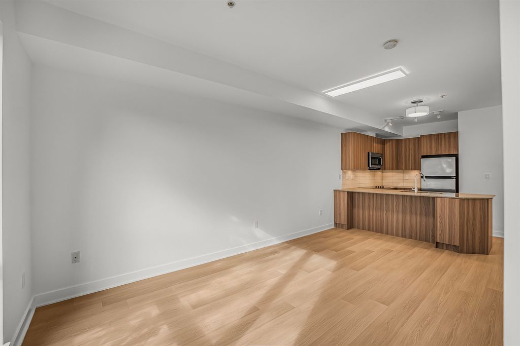 Photo of 13321 102a Avenue #103, Surrey, BC V3T 1P6 (MLS # R3131454)