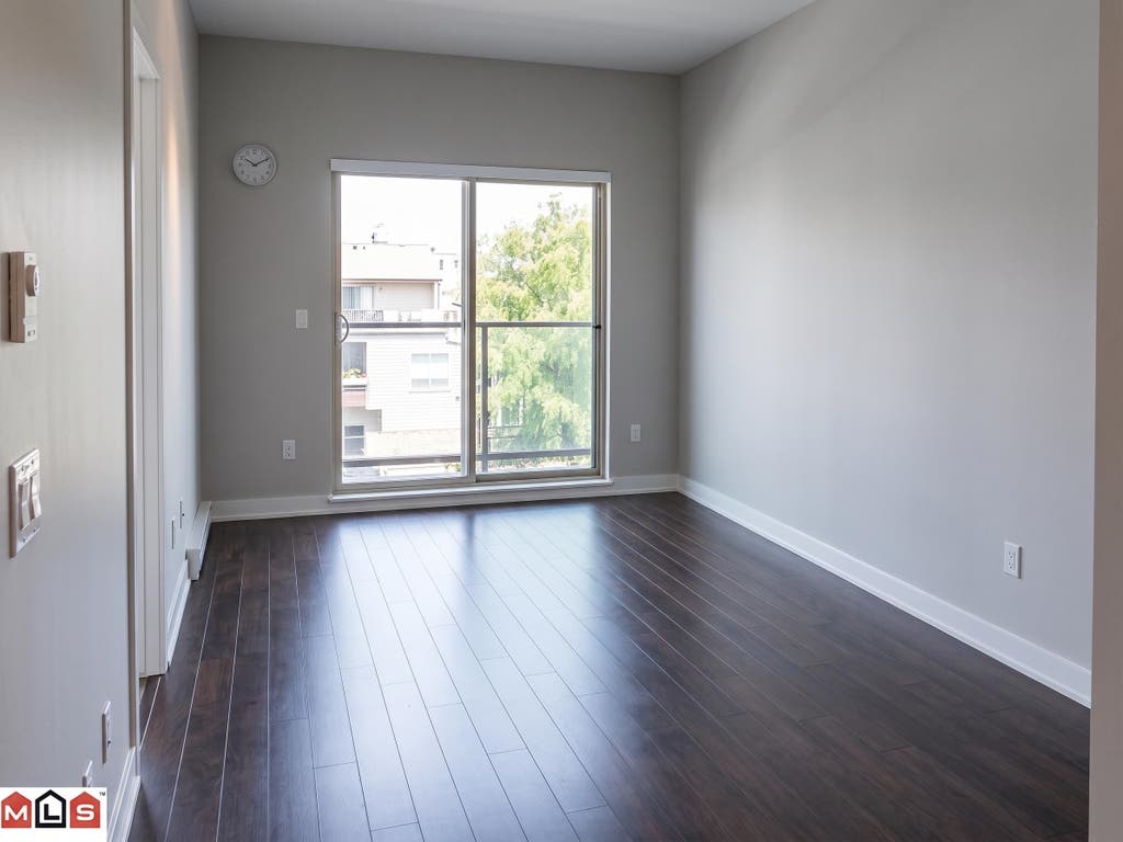 Photo of 20460 Douglas Crescent #302, Langley, BC V3A 0C6 (MLS # R3157094)