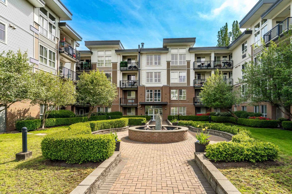 Photo of 5430 201 Street #214, Langley, BC V3A 0A2 (MLS # R3117583)