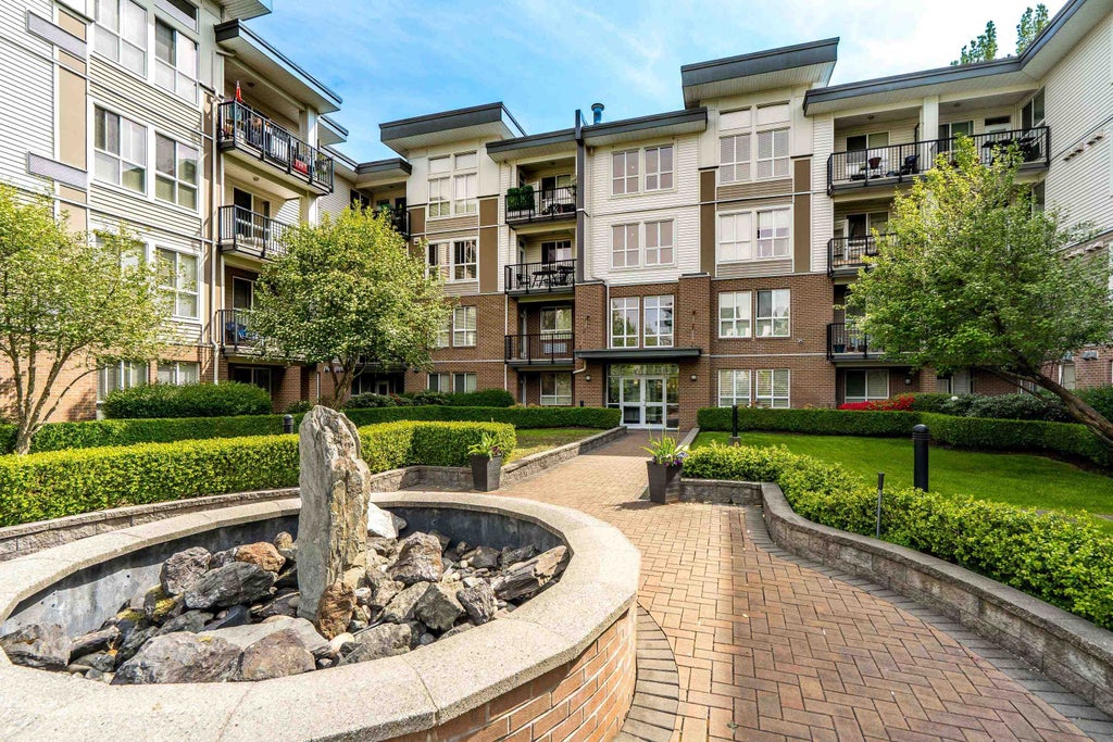Photo of 5430 201 Street #214, Langley, BC V3A 0A2 (MLS # R3117583)