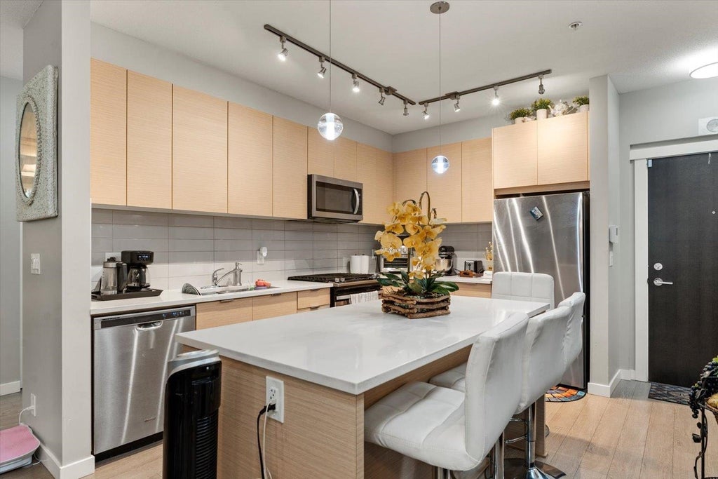 Photo of 8150 207 Street #A110, Langley, BC V2Y 4J2 (MLS # R3164432)