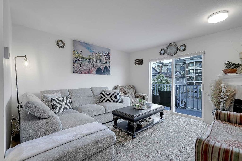 Photo of 19700 56 Avenue #110, Langley, BC V3A 3X6 (MLS # R3125947)