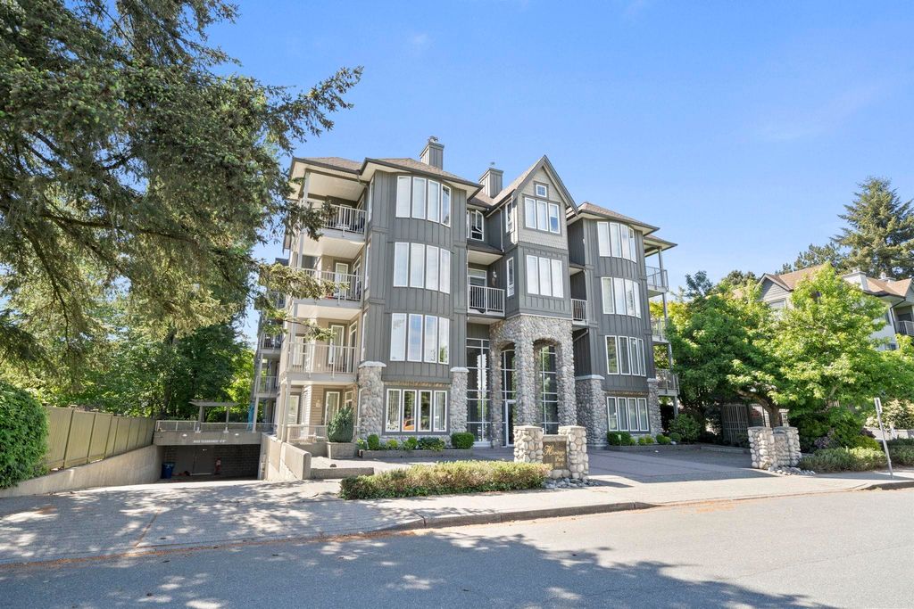 Photo of 5475 201 Street #406, Langley, BC V3A 1P8 (MLS # R3125142)