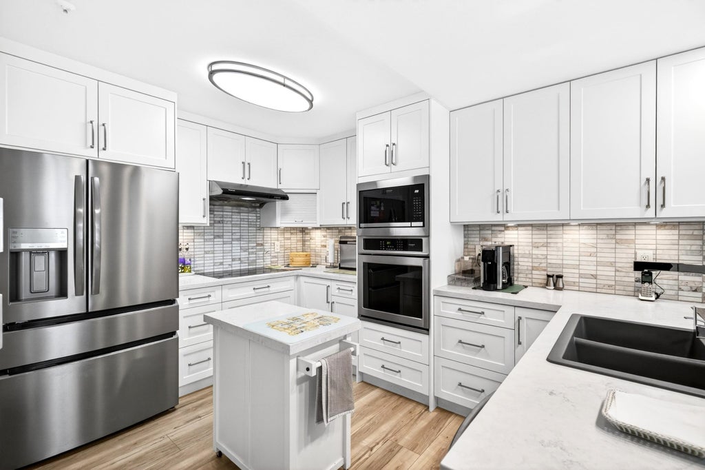 Photo of 20245 53 Avenue #101, Langley, BC V3A 2V2 (MLS # R3139836)