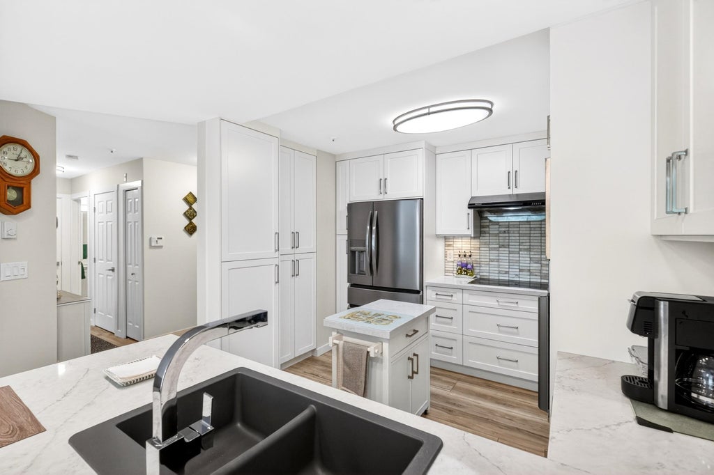 Photo of 20245 53 Avenue #101, Langley, BC V3A 2V2 (MLS # R3139836)