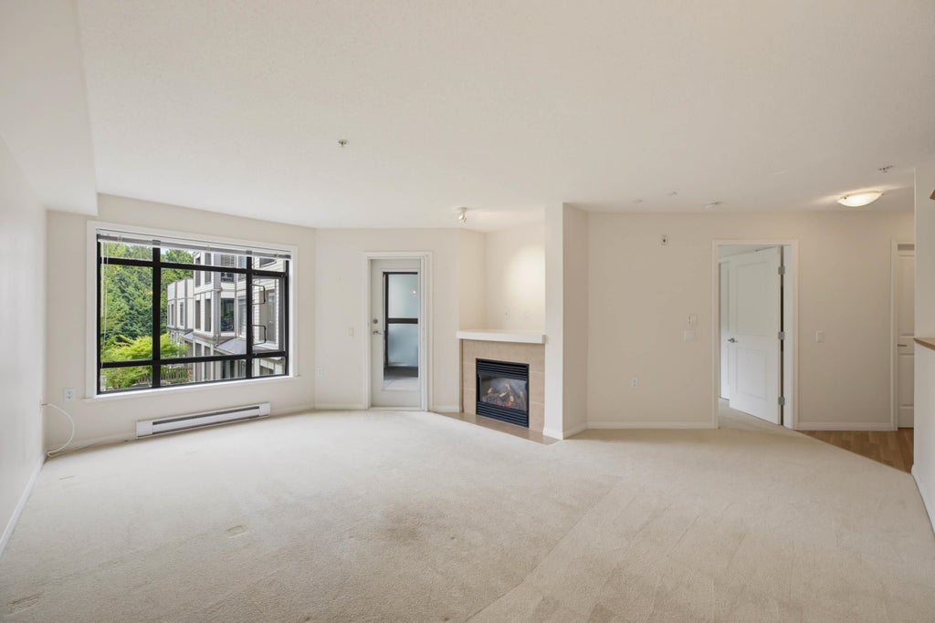 Photo of 8880 202 Street #214, Langley, BC V1M 4E7 (MLS # R3171919)