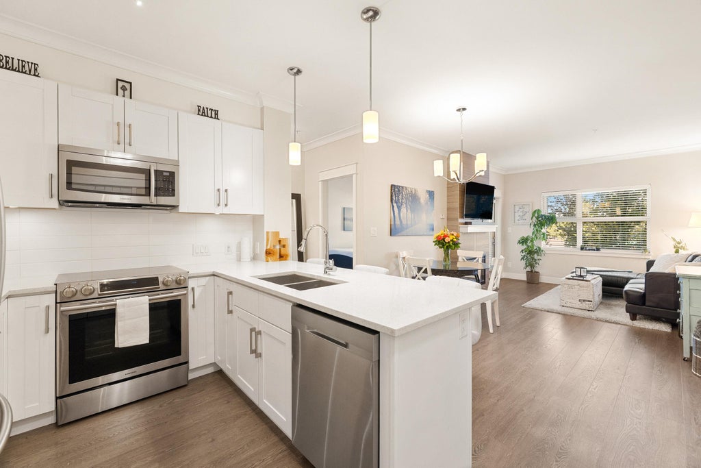 Photo of 5020 221a Street #201, Langley, BC V2Y 0V5 (MLS # R3176818)