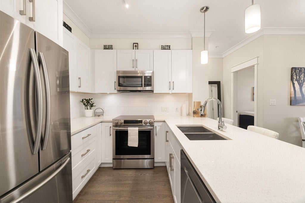 Photo of 5020 221a Street #201, Langley, BC V2Y 0V5 (MLS # R3176818)
