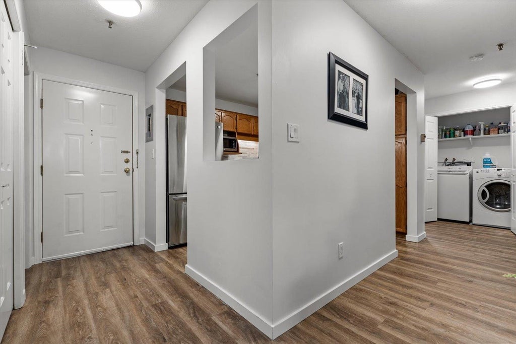 Photo of 5710 201 Street #201, Langley, BC V3A 8A8 (MLS # R3162018)