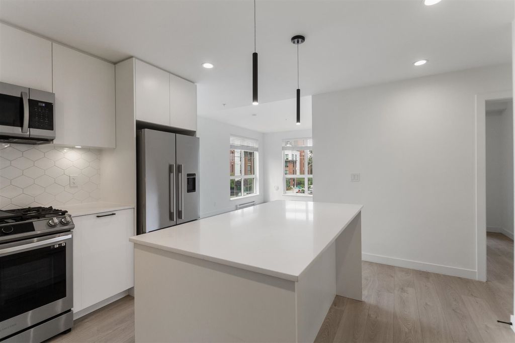 Photo of 8380 200a Street #212, Langley, BC V2Y 3S5 (MLS # R3132022)