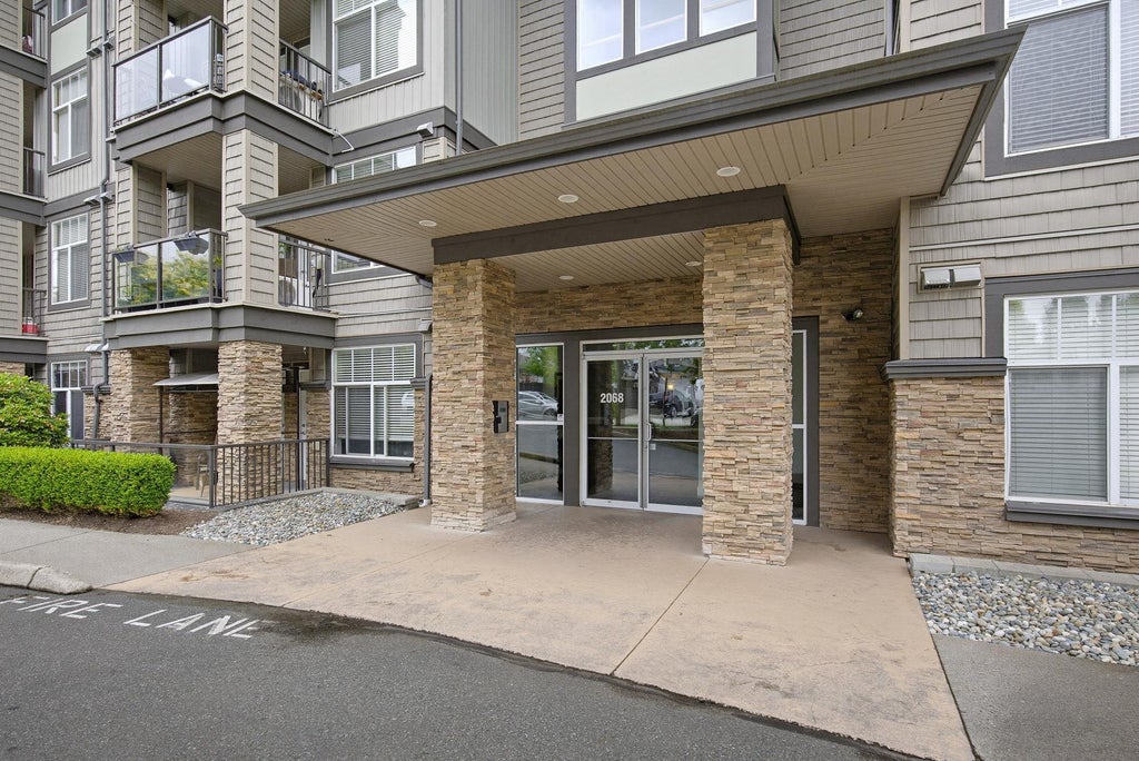 Photo of 2068 Sandalwood Crescent #403, Abbotsford, BC V2S 3H6 (MLS # R3126278)