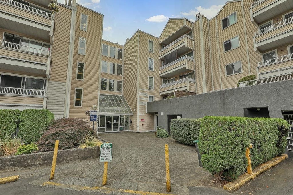 Photo of 9644 134 Street #205, Surrey, BC V3T 5M3 (MLS # R3158053)