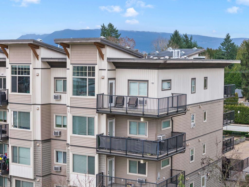 Photo of 11935 Burnett Street #402, Maple Ridge, BC V2X 9A9 (MLS # R3114926)
