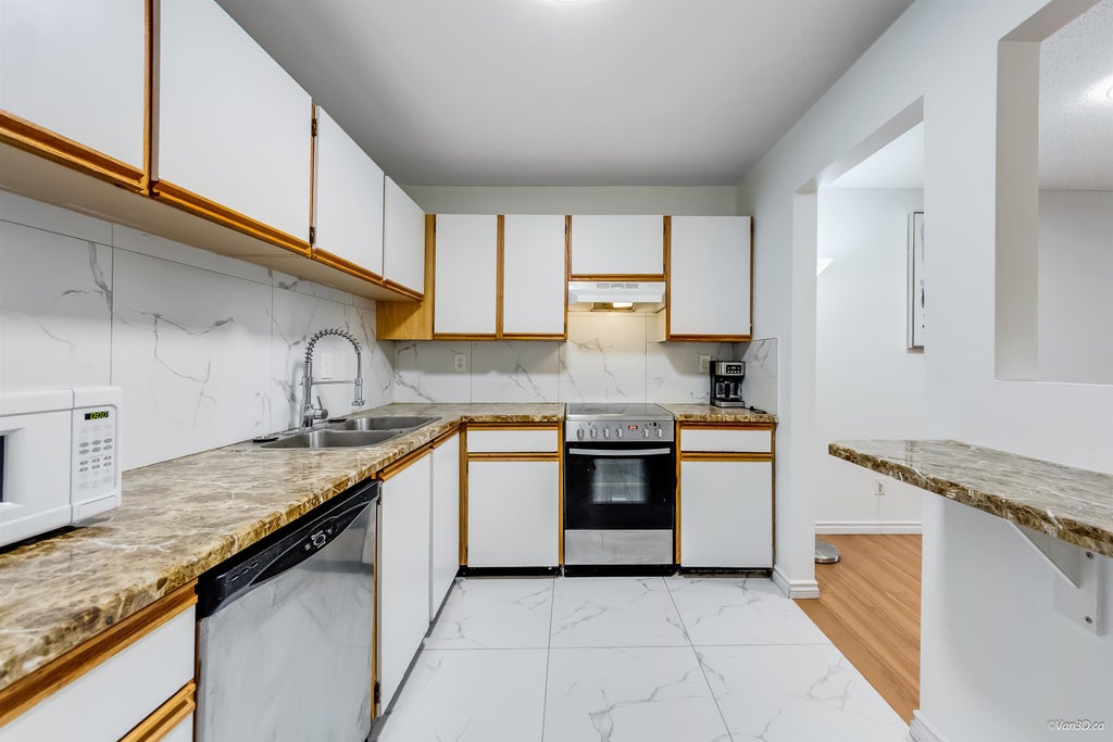 Photo of 13364 102 Avenue #108, Surrey, BC V3T 5L8 (MLS # R3132331)