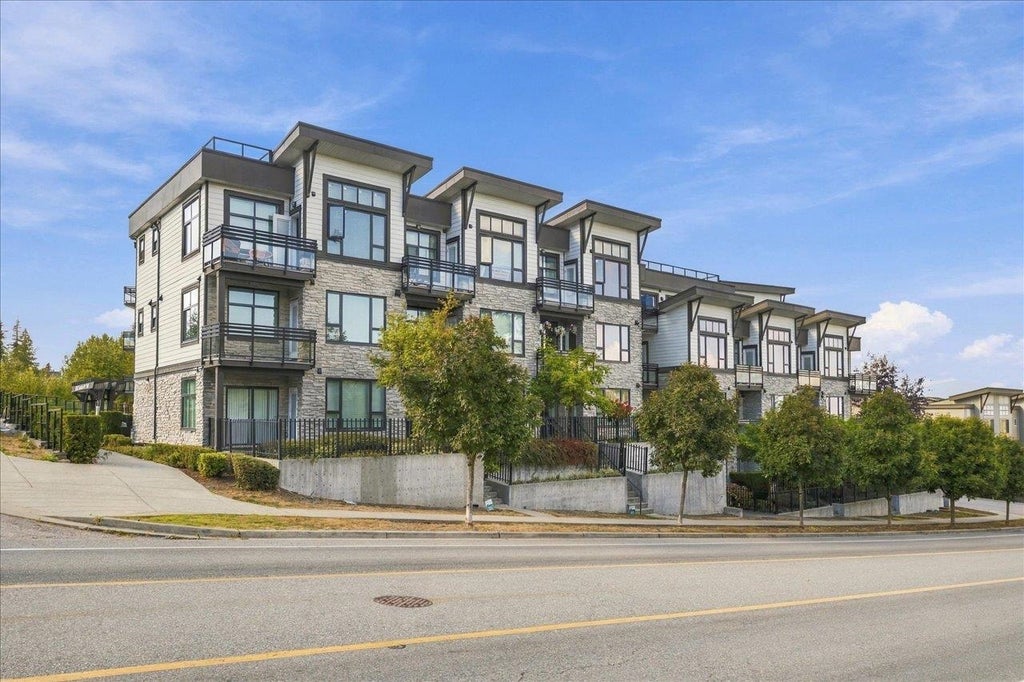 Photo of 9983 E Barnston Drive #309, Surrey, BC V4N 6T3 (MLS # R3166132)