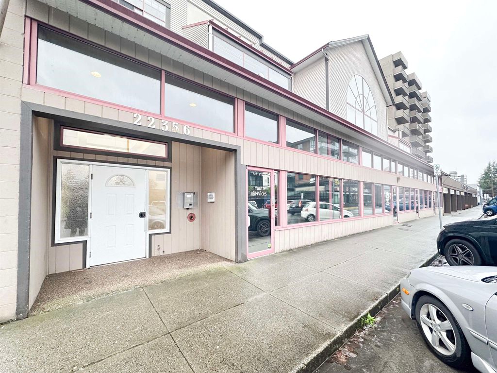 Photo of 22356 Mcintosh Avenue #211, Maple Ridge, BC V2X 3C1 (MLS # R3105852)