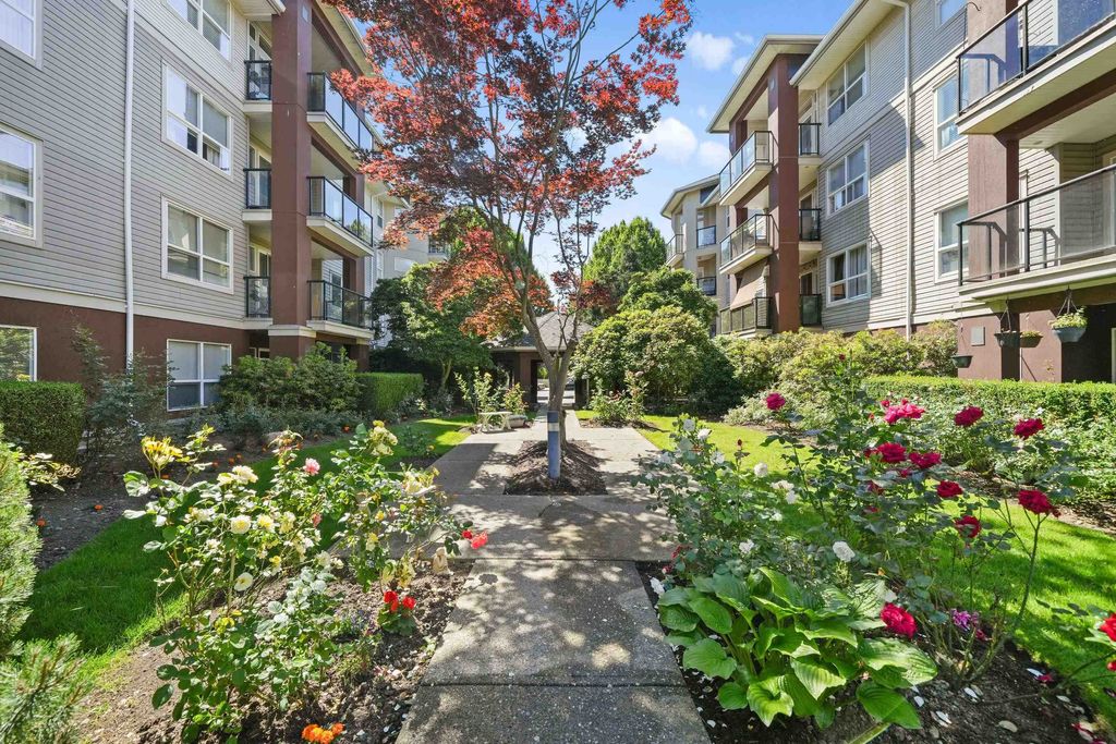 Photo of 20239 Michaud Crescent #105, Langley, BC V3A 8L1 (MLS # R3131846)